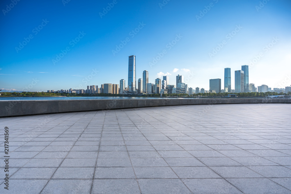empty square with city skyline empty square with city skyline