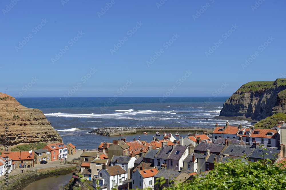 Overlook of the colorful fishing village of Staithes in North Yorkshire, England