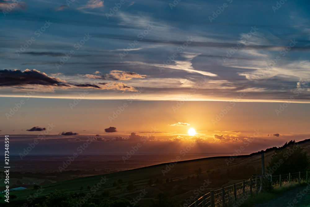 Sunsets above the english countryside.