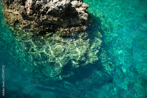 Vivid blue sea in laguna and rock Turkey