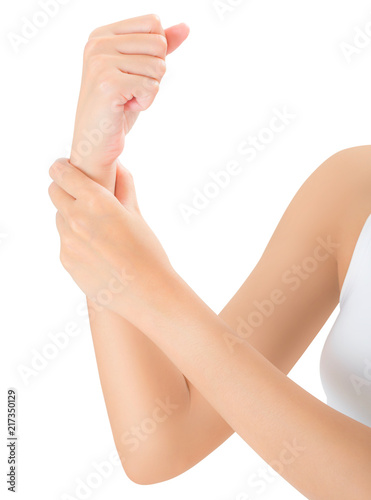 woman holding her wrist and massaging in pain area  Isolated on white background.
