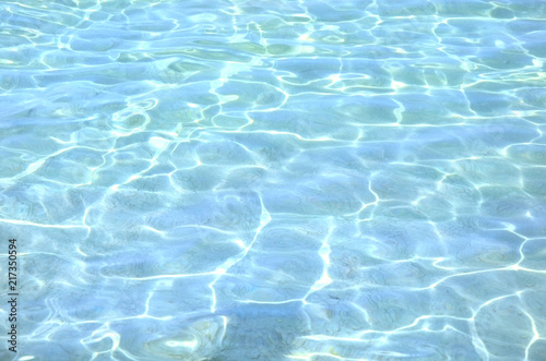 surface of blue swimming pool, background of water in sea