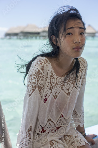 Young woman in white dress