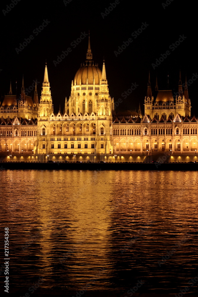 hungarian parliament by night in budapest, hungary