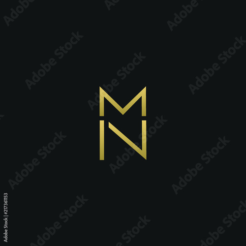 Modern unique elegant MN black and golden color initial based letter icon logo