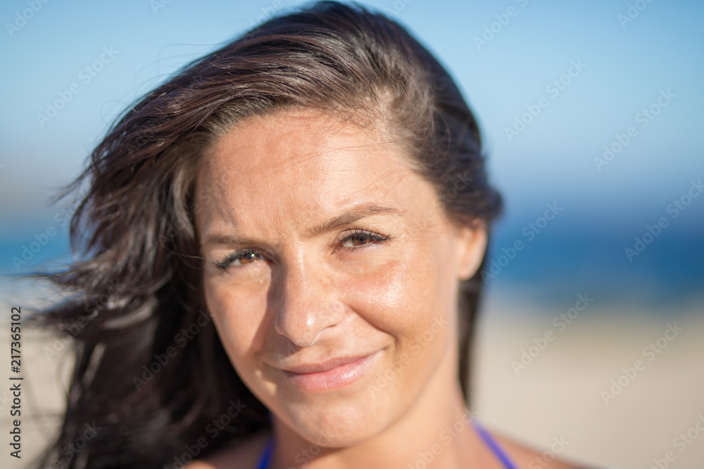 A pregnant model on the beach in summer. A pregnant model on the beach in summer.