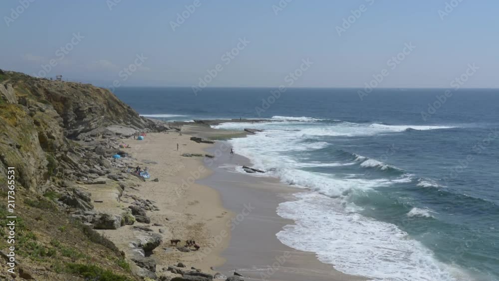 view of Pedra Branca beach in Ericeira village in Portugal view of Pedra Branca beach in Ericeira village in Portugal