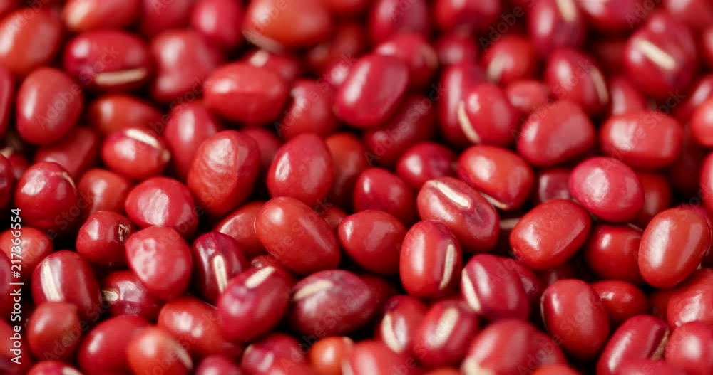 Spinning heap of red mung bean Spinning heap of red mung bean