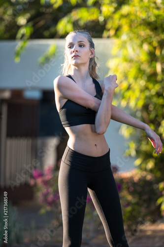 Blong Teen Girl Stretching in the Park