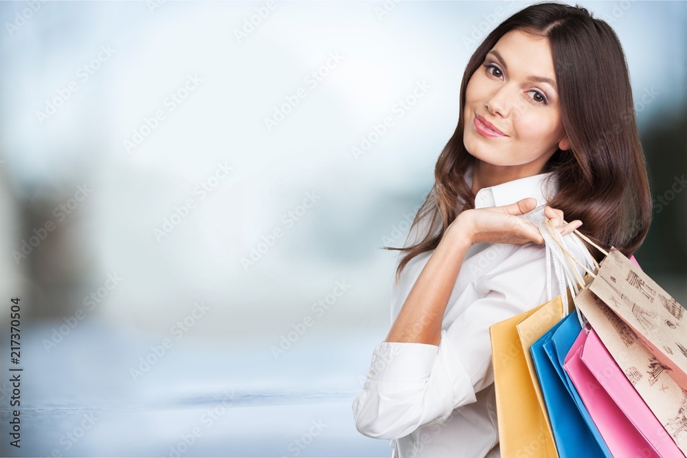 Young woman with shopping bags Young woman with shopping bags
