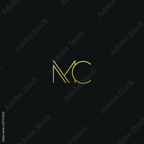 Creative modern elegant MC black and gold color initial based letter icon logo.