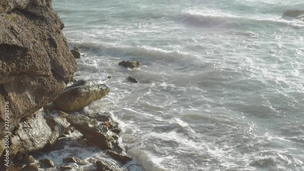 Close up of waves crushing on the west coastline of Rhodes Island, Greece. Shot internally in 96 frames/second. Close up of waves crushing on the west coastline of Rhodes Island, Greece. Shot internally in 96 frames/second.