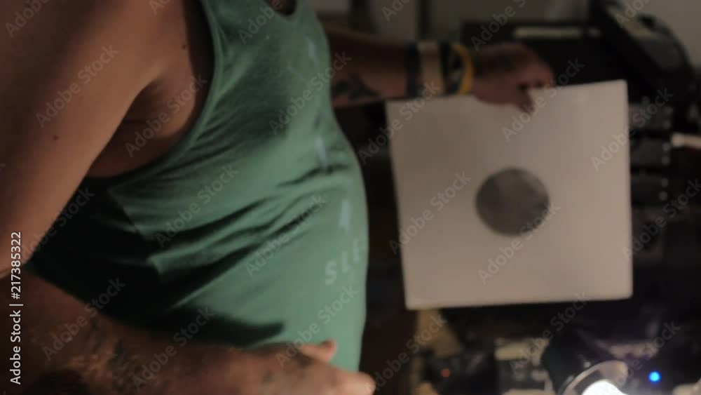 Slow Motion Man Putting New Vinyl Record Into Sleeve Slow Motion Man Putting New Vinyl Record Into Sleeve