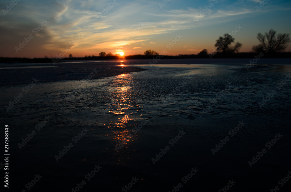 Beautiful winter sunset on river Dnieper