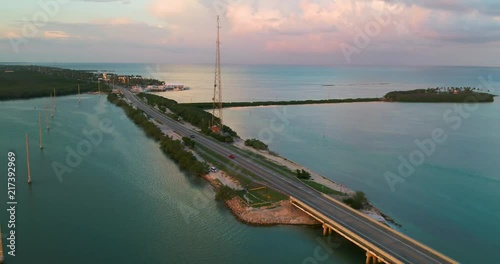 Some aerial footage of a bridge in the Florida Keys at sunset. photo