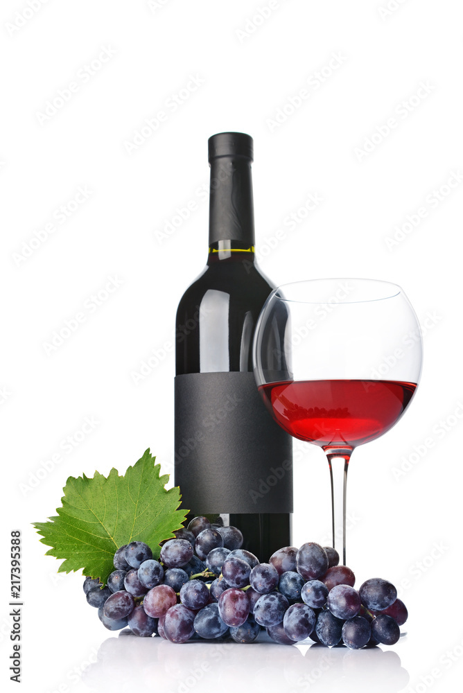 Red wine bottle with empty black label and glass for tasting with fresh grape
