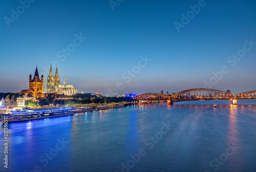 The famous skyline of Cologne with the cathedral at dusk