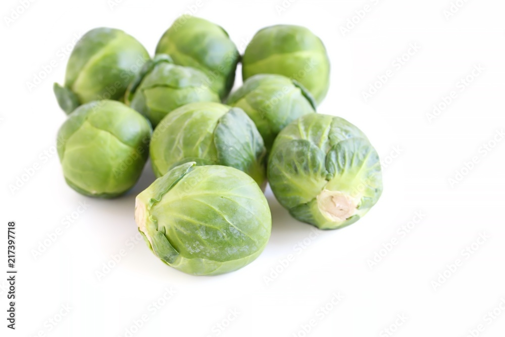 Fresh Brussels Sprouts on White Background Fresh Brussels Sprouts on White Background