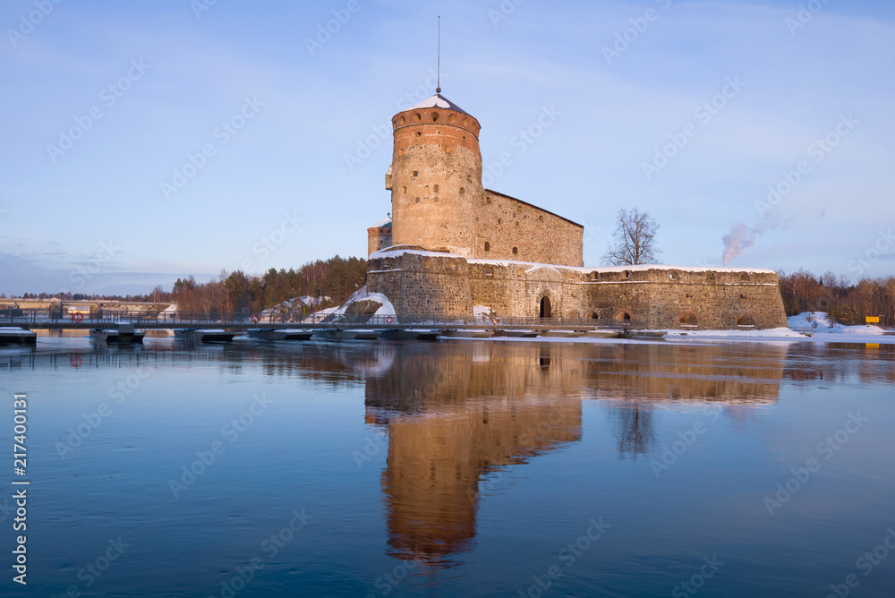 Olavinlinna fortress in the evening of March. Savonlinna, Finland