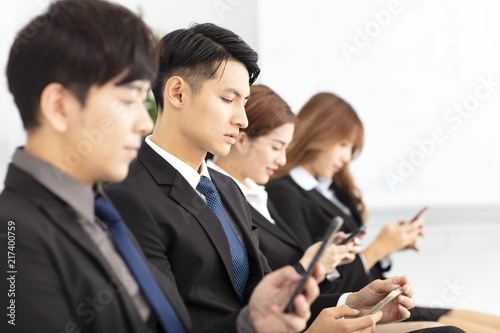 young business people using the smart phone