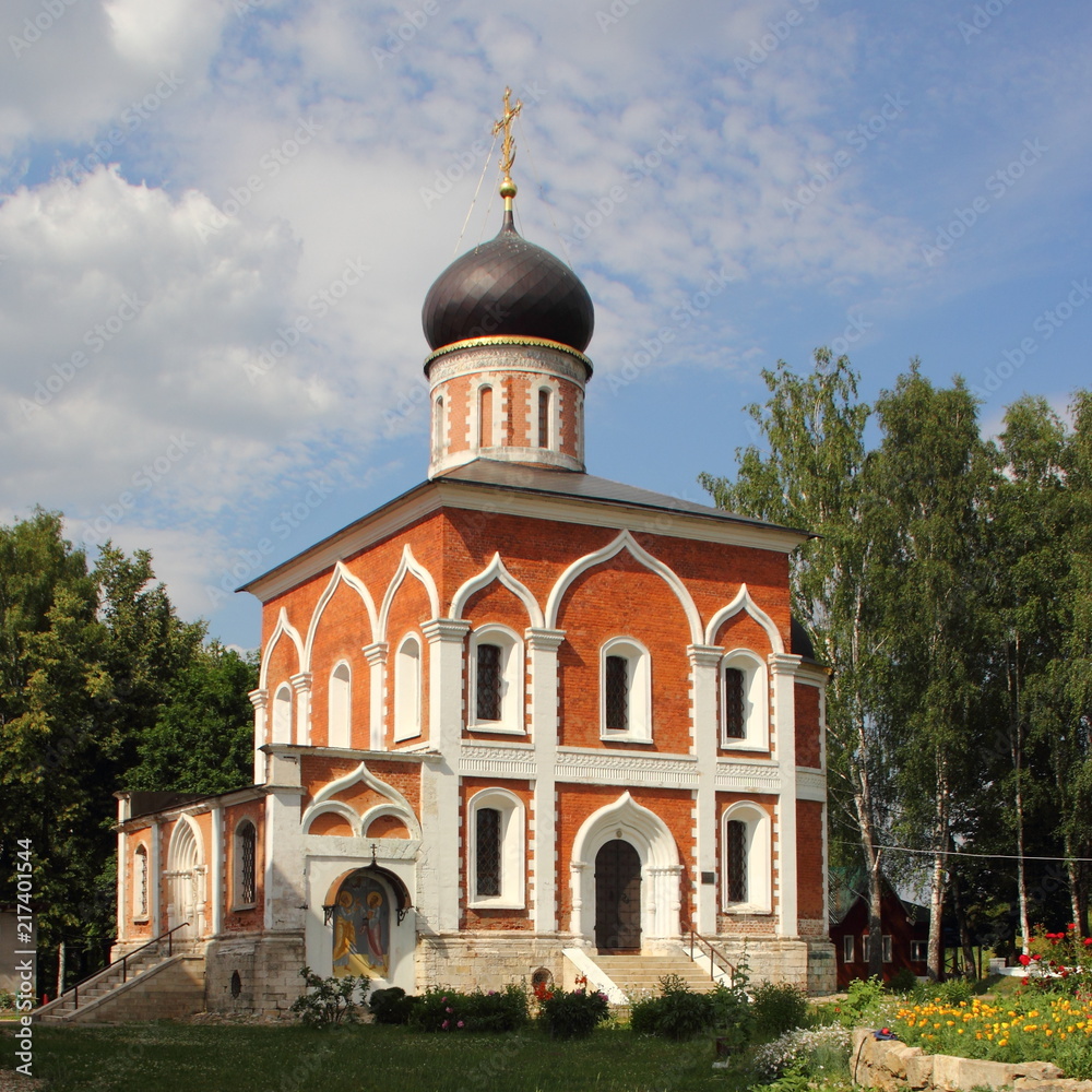 Russia, Mozhaisk Kremlin, region landmark Peter and Paul Church on a summer day against the blue sky with clouds – medieval architecture, old buildings, christianity, red brown cathedral Russia, Mozhaisk Kremlin, region landmark Peter and Paul Church on a summer day against the blue sky with clouds – medieval architecture, old buildings, christianity, red brown cathedral