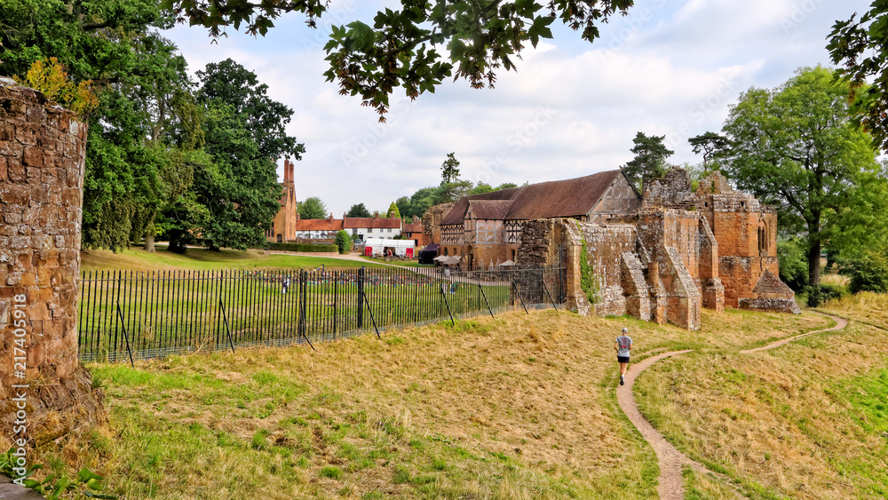 Tudor stables in Kenilworth Castle, surrounded by the Norman keep, defensive walls.