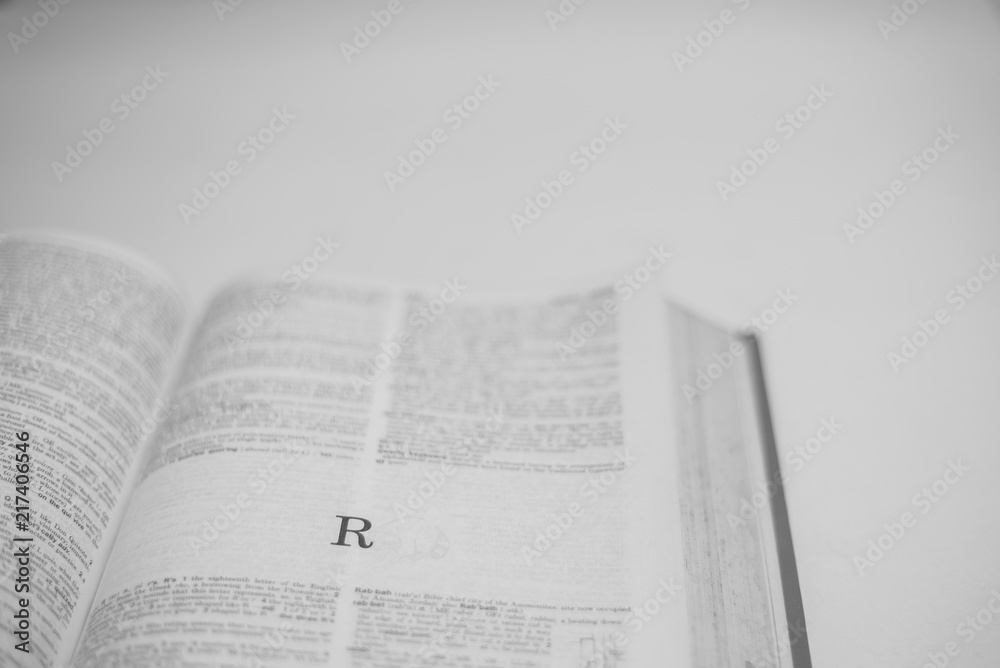 Roman A to Z alphabet printed on open book Roman A to Z alphabet printed on open book
