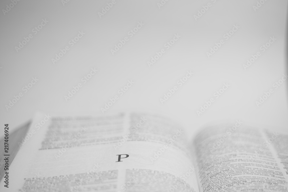 Roman A to Z alphabet printed on open book Roman A to Z alphabet printed on open book