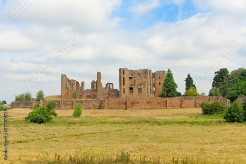 The spectacular ruins, built mostly from the local red sandstone, reveal much of its medieval and Tudor past. photo