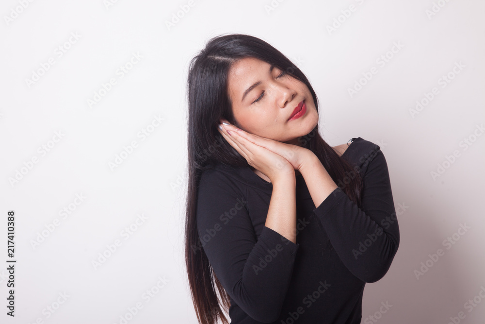 Beautiful young Asian woman with sleeping gesture. Beautiful young Asian woman with sleeping gesture.