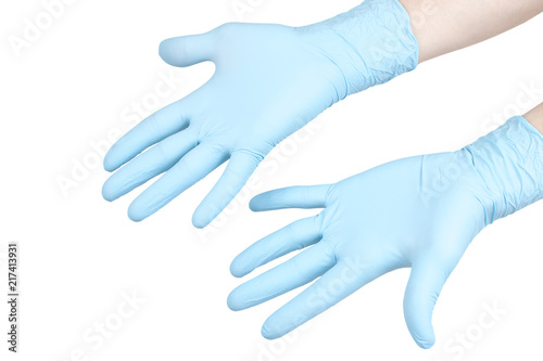Hands in protective blue gloves, isolated on white background.