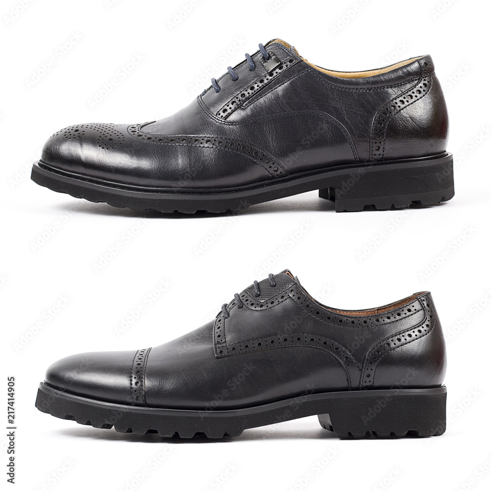 Classic male black leather shoe isolated on a white Classic male black leather shoe isolated on a white