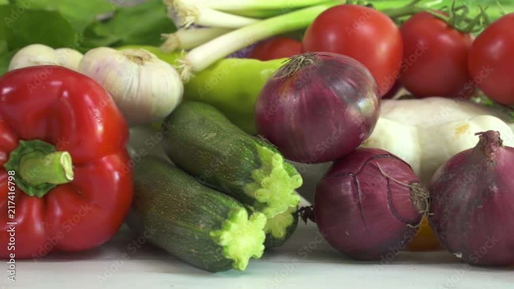 Heap of fresh vegetables. Assortment vegetables on the table. Slider shot Heap of fresh vegetables. Assortment vegetables on the table. Slider shot