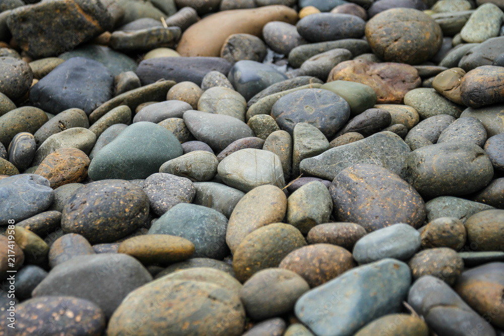 Black pebbles stone background Black pebbles stone background