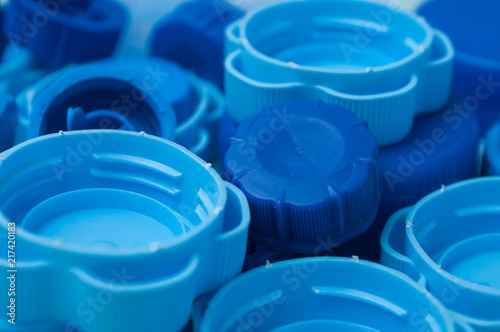 closeup of blue plastic plugs for recycling