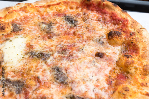 Tasty Italian pizza with anchovies