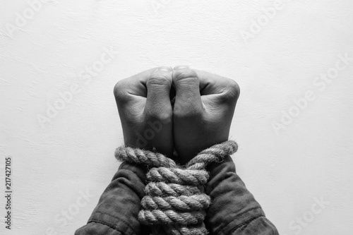 bound hands. stop human trafficking