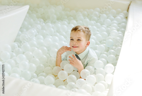 toddler boy in pool