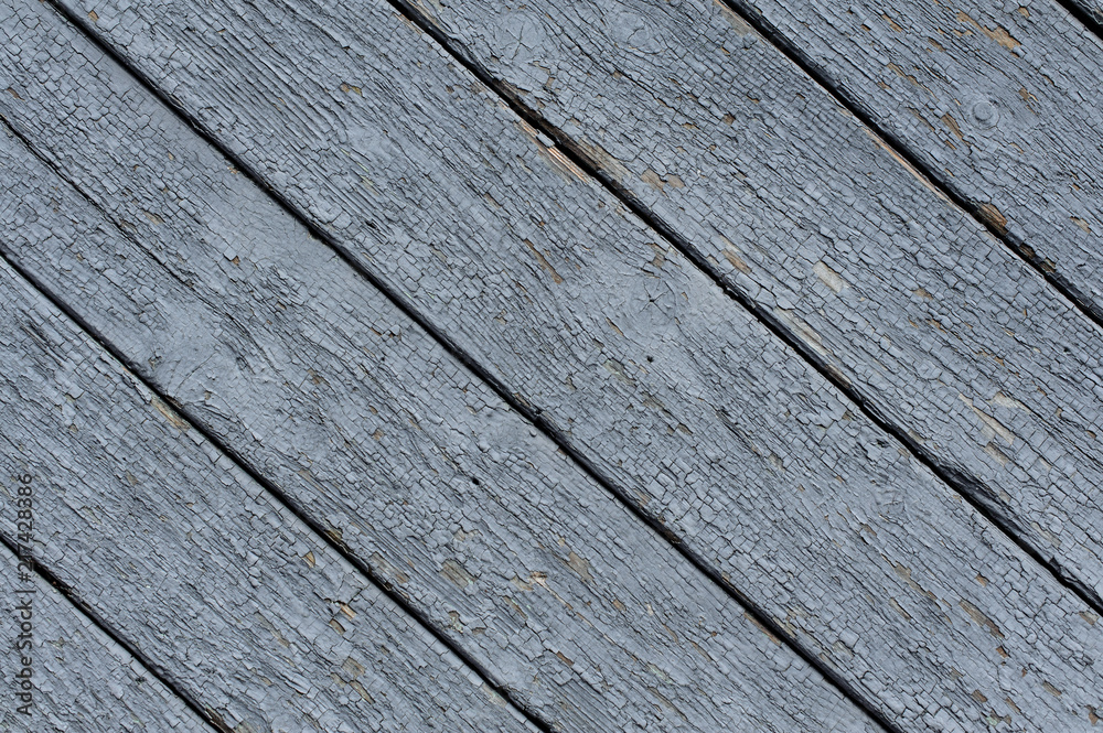 Painted in light blue color old wooden long boards Painted in light blue color old wooden long boards