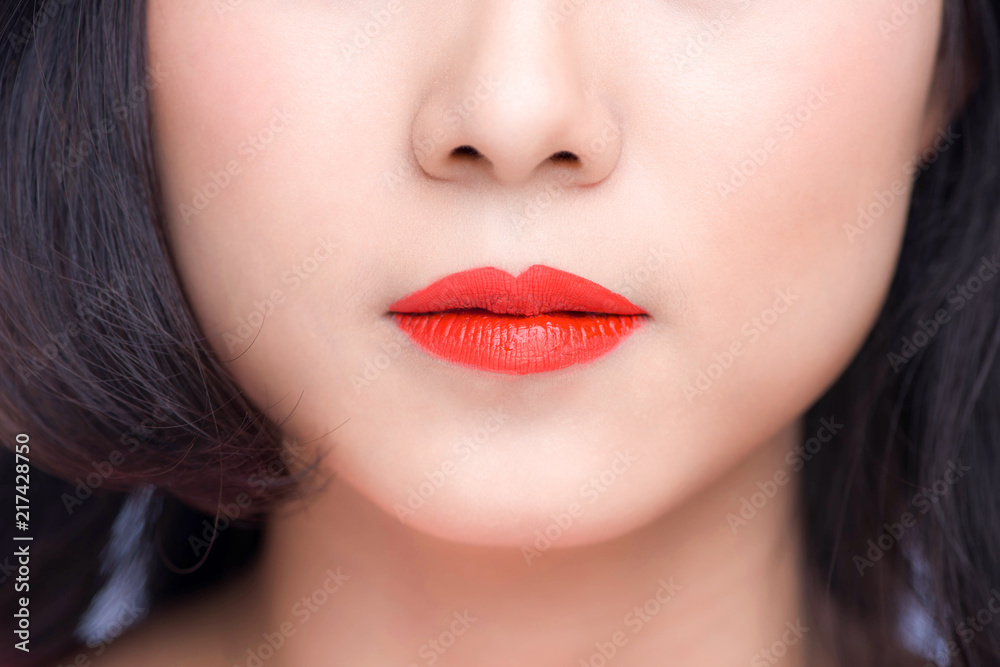 Macro of woman's face part. Red lips makeup. Macro of woman's face part. Red lips makeup.