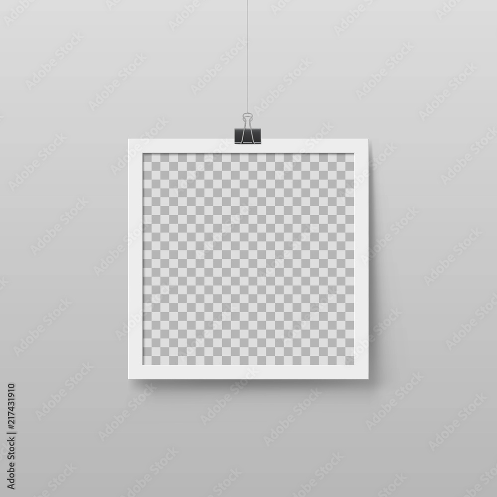 Realistic blank photo frame hanging on binder clip. Layout for art