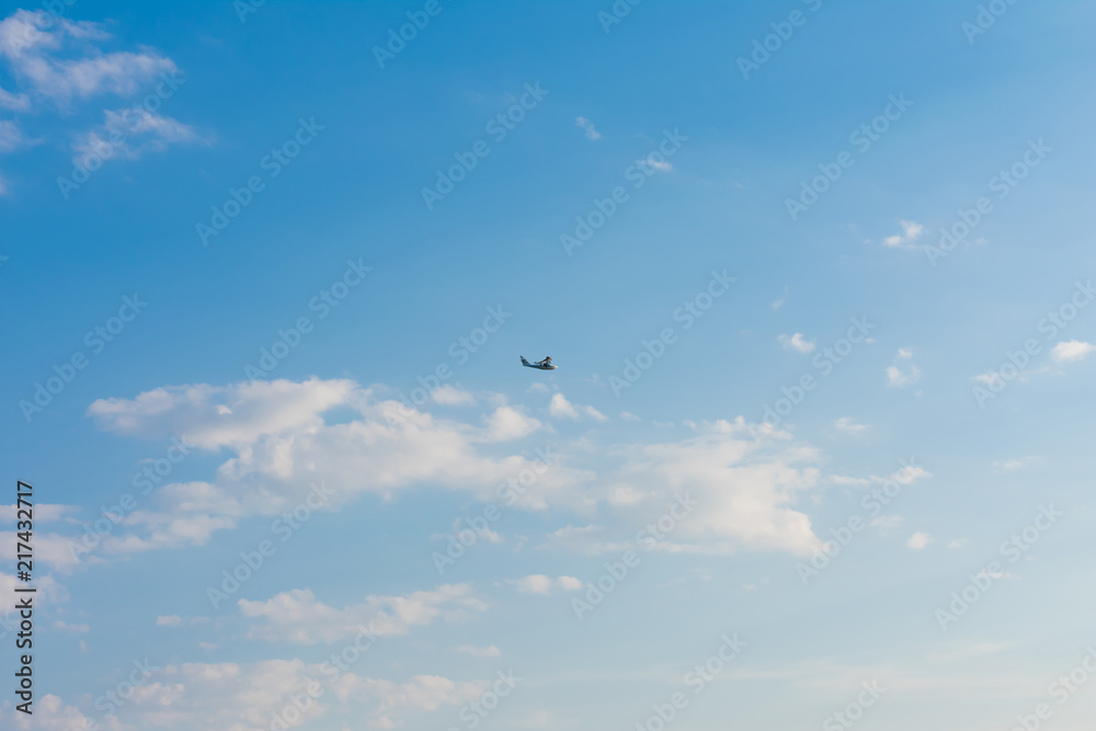 Seaplane. Flying boat on blue sky.