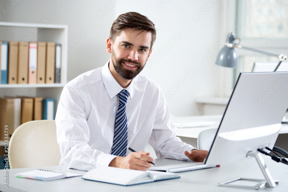 Businessman working in an office Businessman working in an office