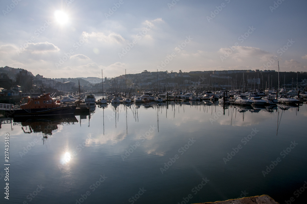 Boats in Brixham harbour on a winters afternoon Boats in Brixham harbour on a winters afternoon
