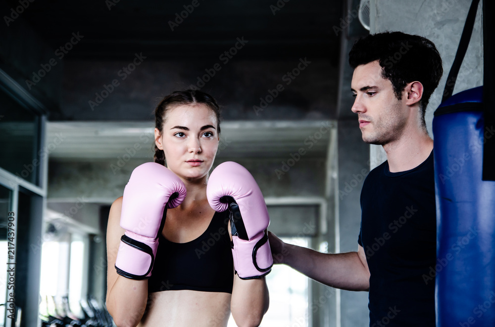 Attractive Female Boxer At Training in gym Attractive Female Boxer At Training in gym