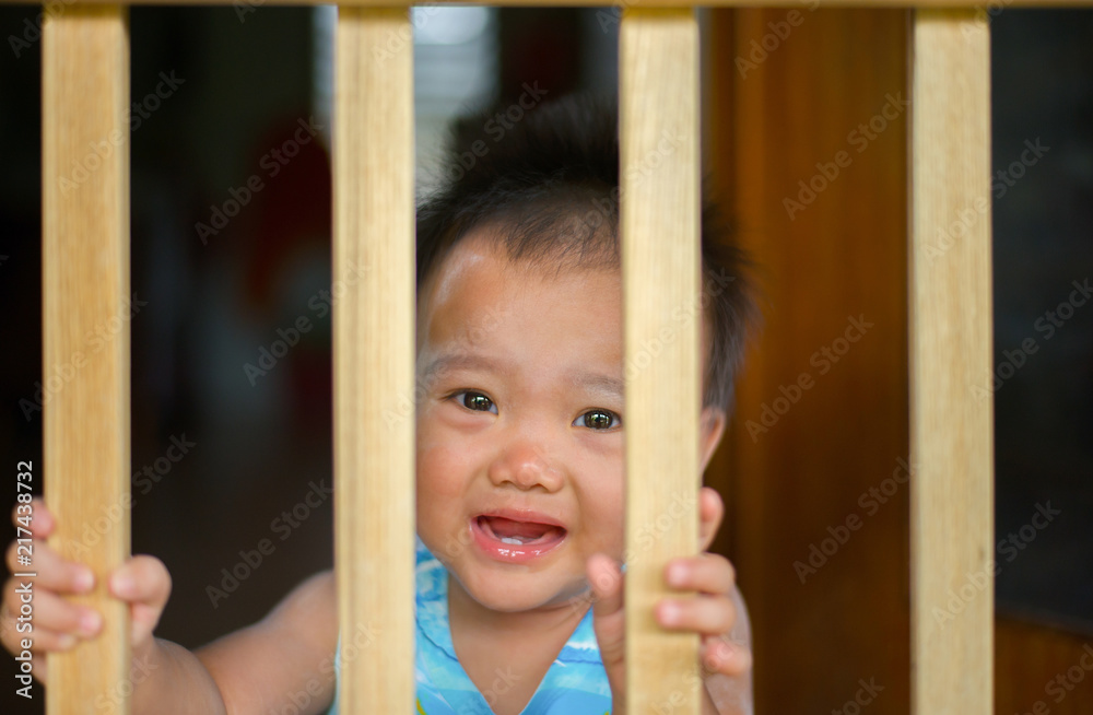 Fototapeta premium Asian baby face is crying