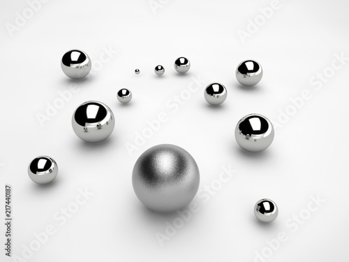 silver and steel balls scattered over the surface of a sphere of different sizes. The idea of disorder and chaos. Abstraction, picture isolated on white background. 3D redering.