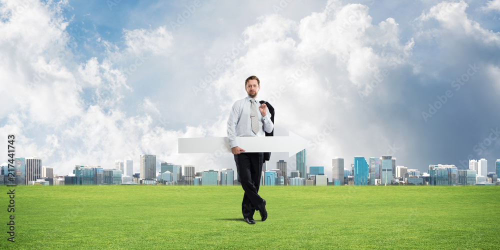 Conceptual image of businessman pointing aside Conceptual image of businessman pointing aside