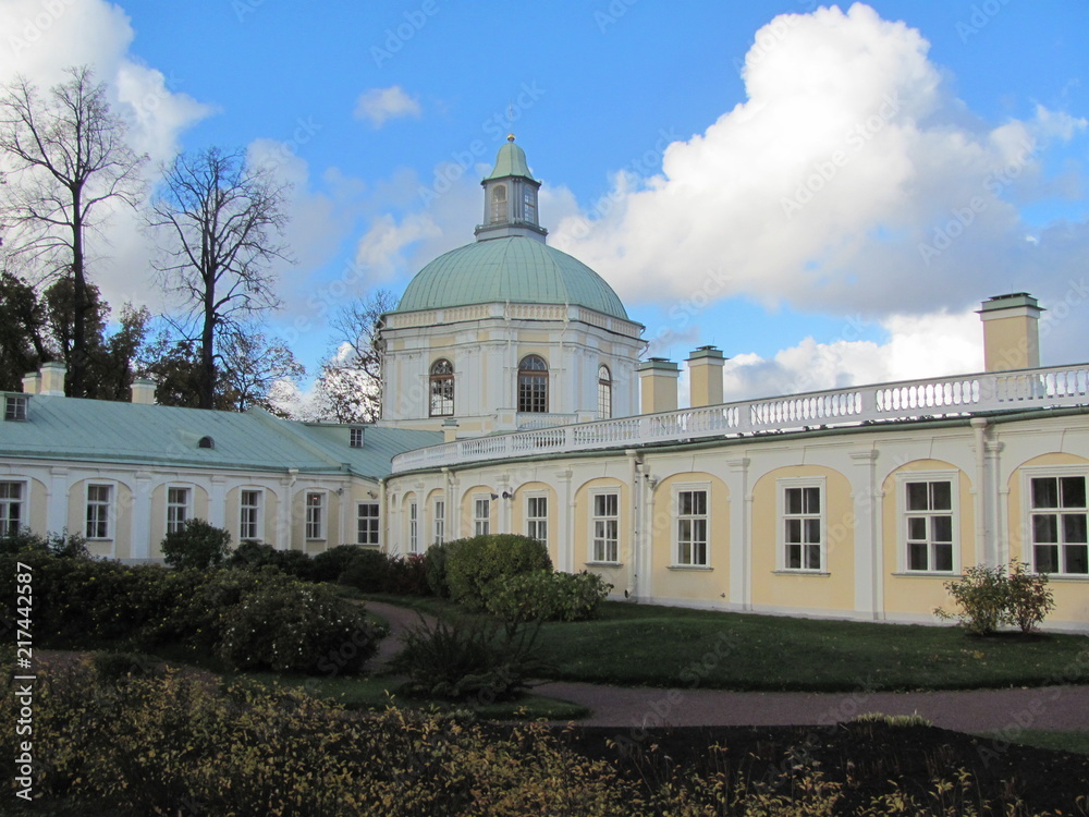 Yellow palace with a dome of a church