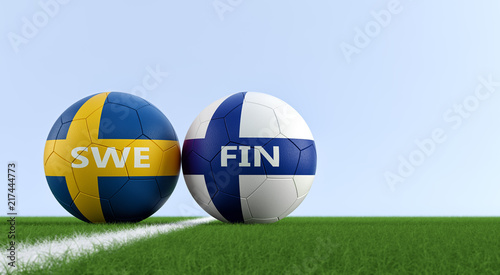 Sweden vs. Finland Soccer Match - Soccer balls in Sweden and Finlands national colors on a soccer field. Copy space on the right side - 3D Rendering 